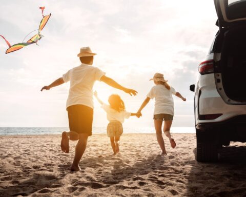 Happy family enjoying Noosa 4WD