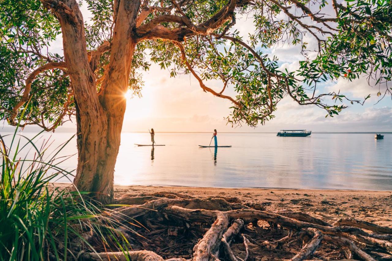 Habitat Noosa - Stand up paddle boarding from your campsite