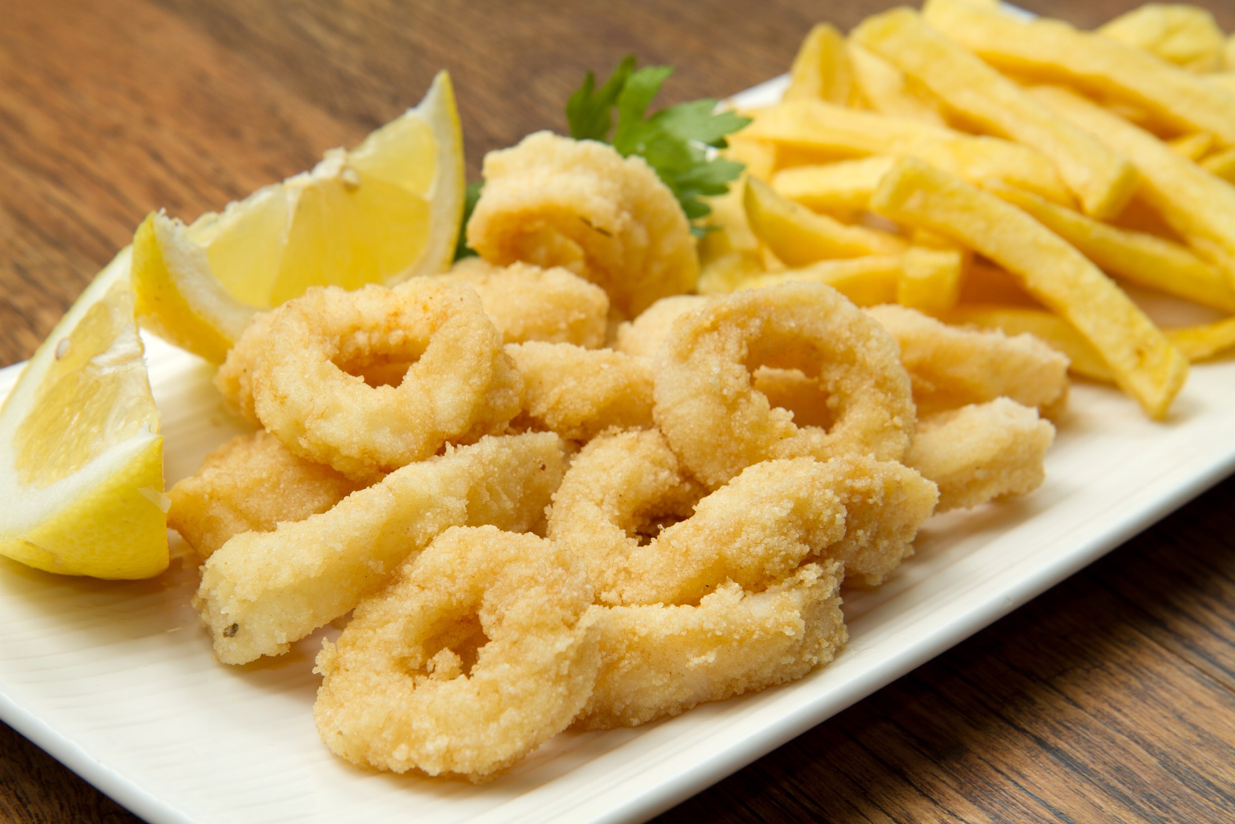 A plate of calamari and chips - Best Fish And Chips in Noosa