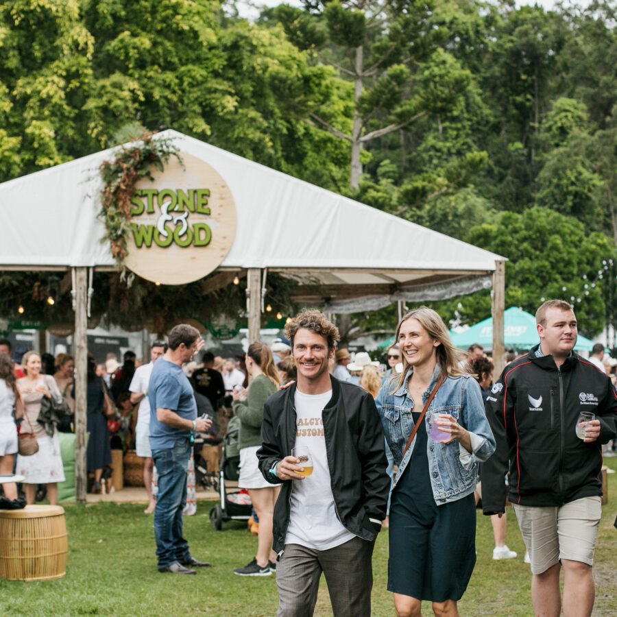 People Smiling and drinking at the Noosa Eat and Drink Festival 